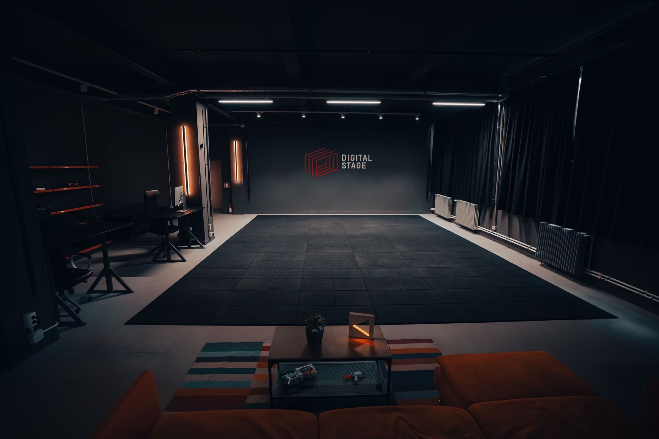 Digital Stage filming space in Bucharest, with an open stage, lighting and black curtains